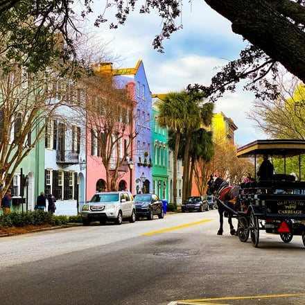 Rainbow Row with horse carriage, Charleston SC